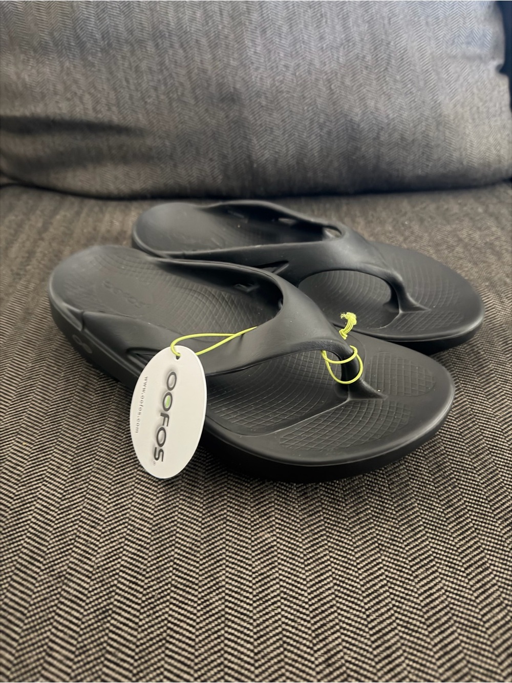 OOFOS Black Flip Flop Sandals with Neon Yellow Tag
